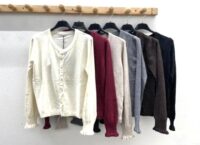 Bleščeča jopa z gumbi